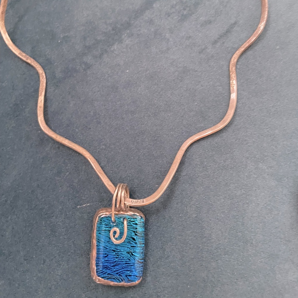 sterling silver neck wire with blue charm and matching bracelet set